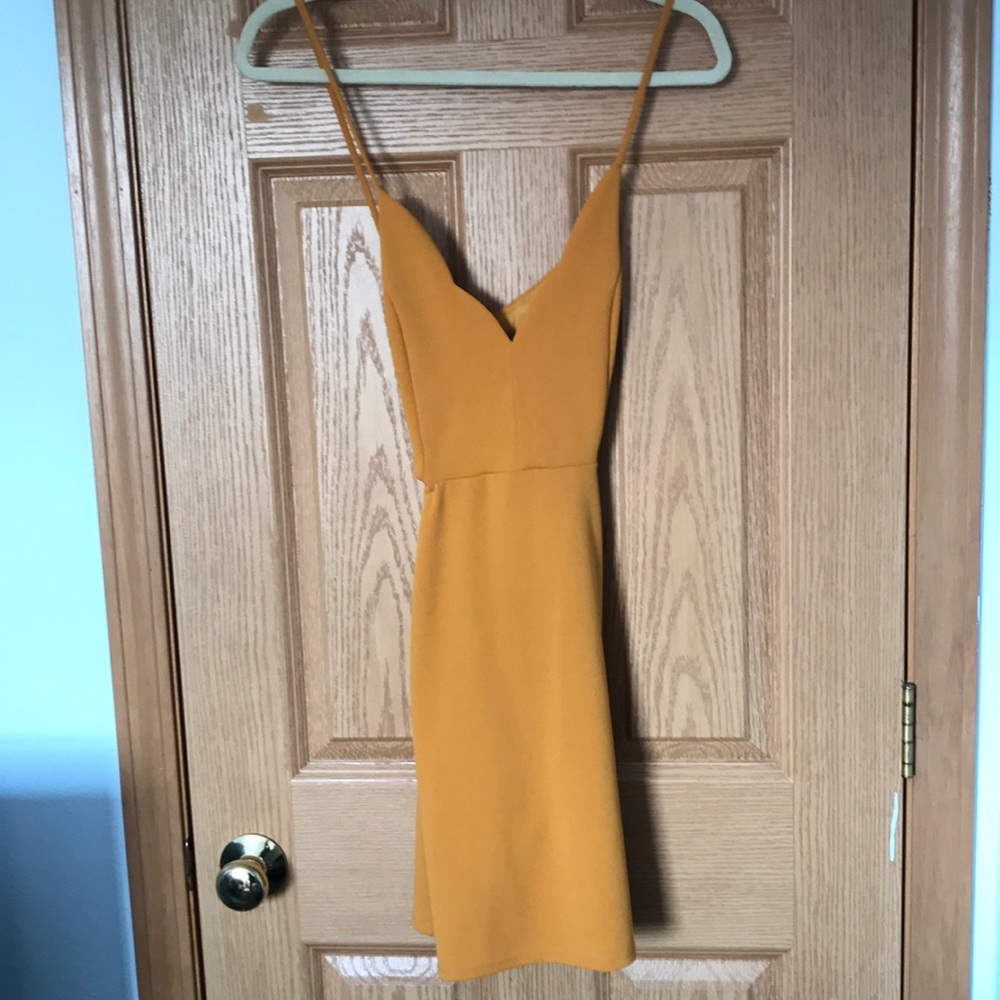 Mustard yellow dress with scallop detailing